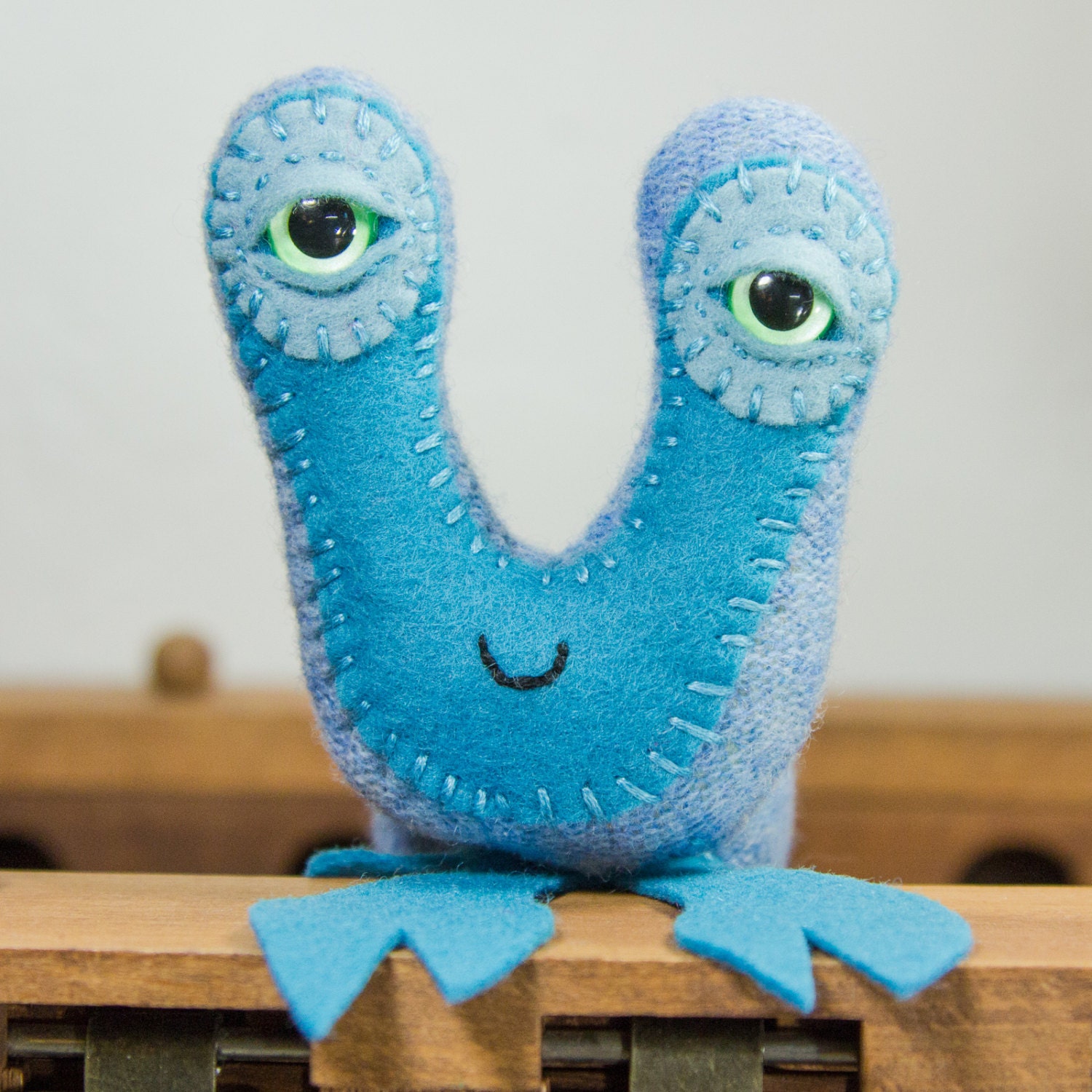 So Charming Chandra tealy blues spring lobster in recycled robins egg blue speckled lambswool and merino wool felt