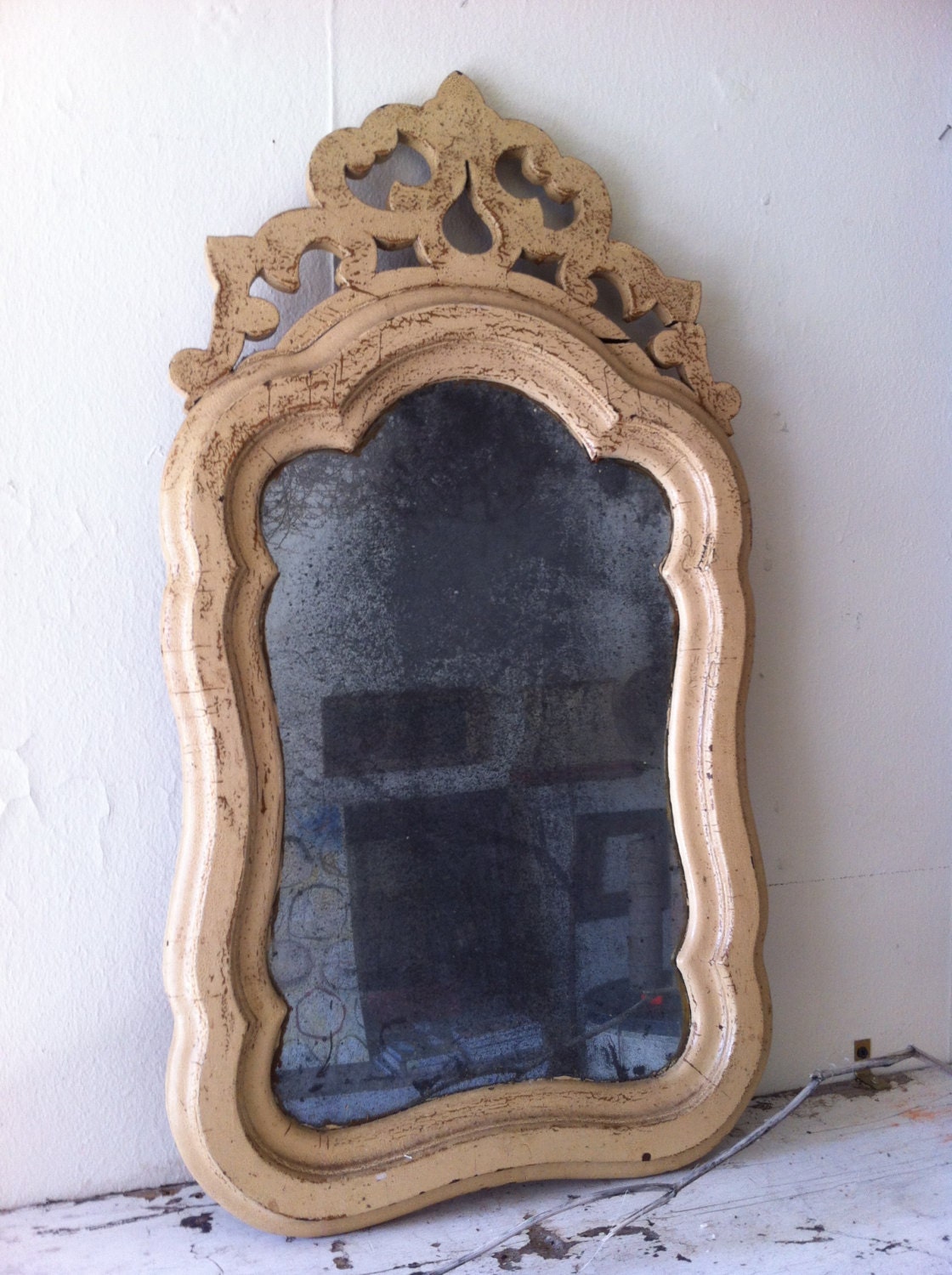 vintage mercury glass mirror with ornate frame