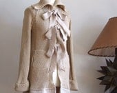 Very feminine beige knitted cardigan coat with silk ruffle and bows, spring knitted coat, long knitted cardigan embelished
