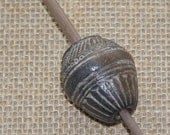 African bead-whorl support spindle