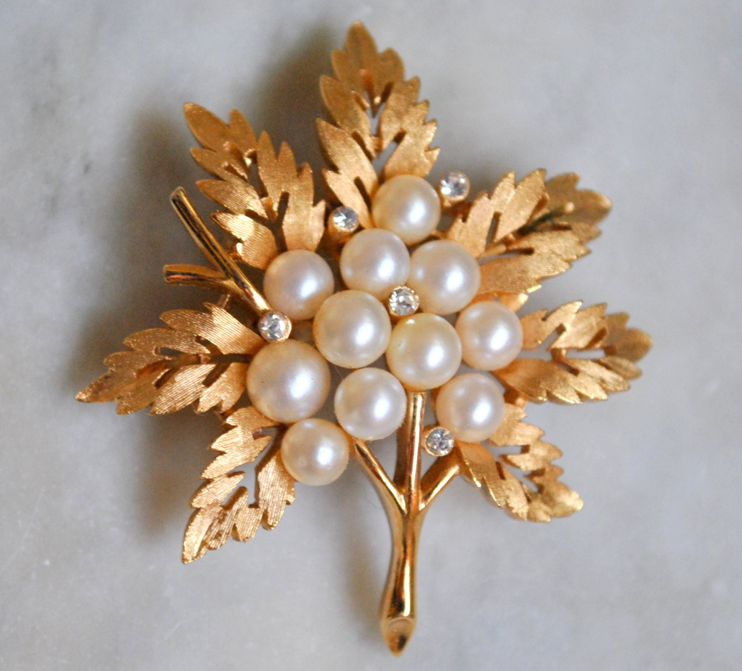 Beautiful Crown Trifari Brooch with Clustered Pearls, Rhinestones and Gold Leaves