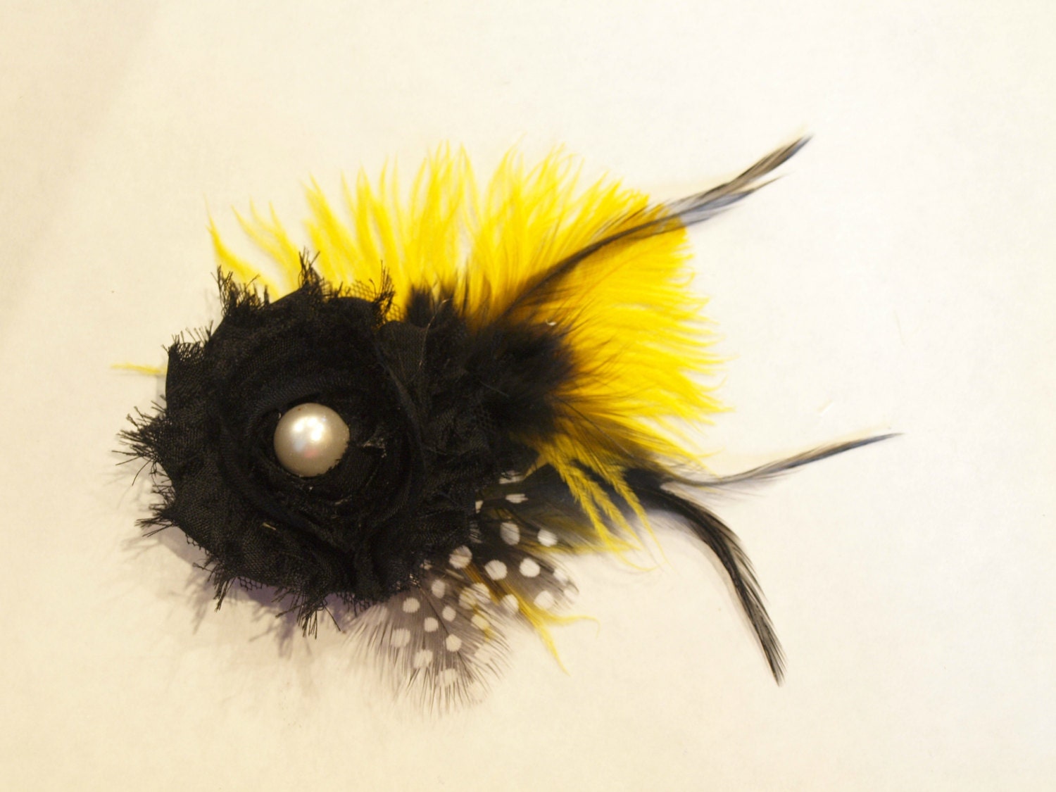 Yellow and Black Feather Hair Clip.