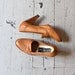 vintage loafer heels / 70s stacked heel / woven leather loafer pumps