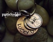 Lucky Us Copper Keychain with two lucky pennies
