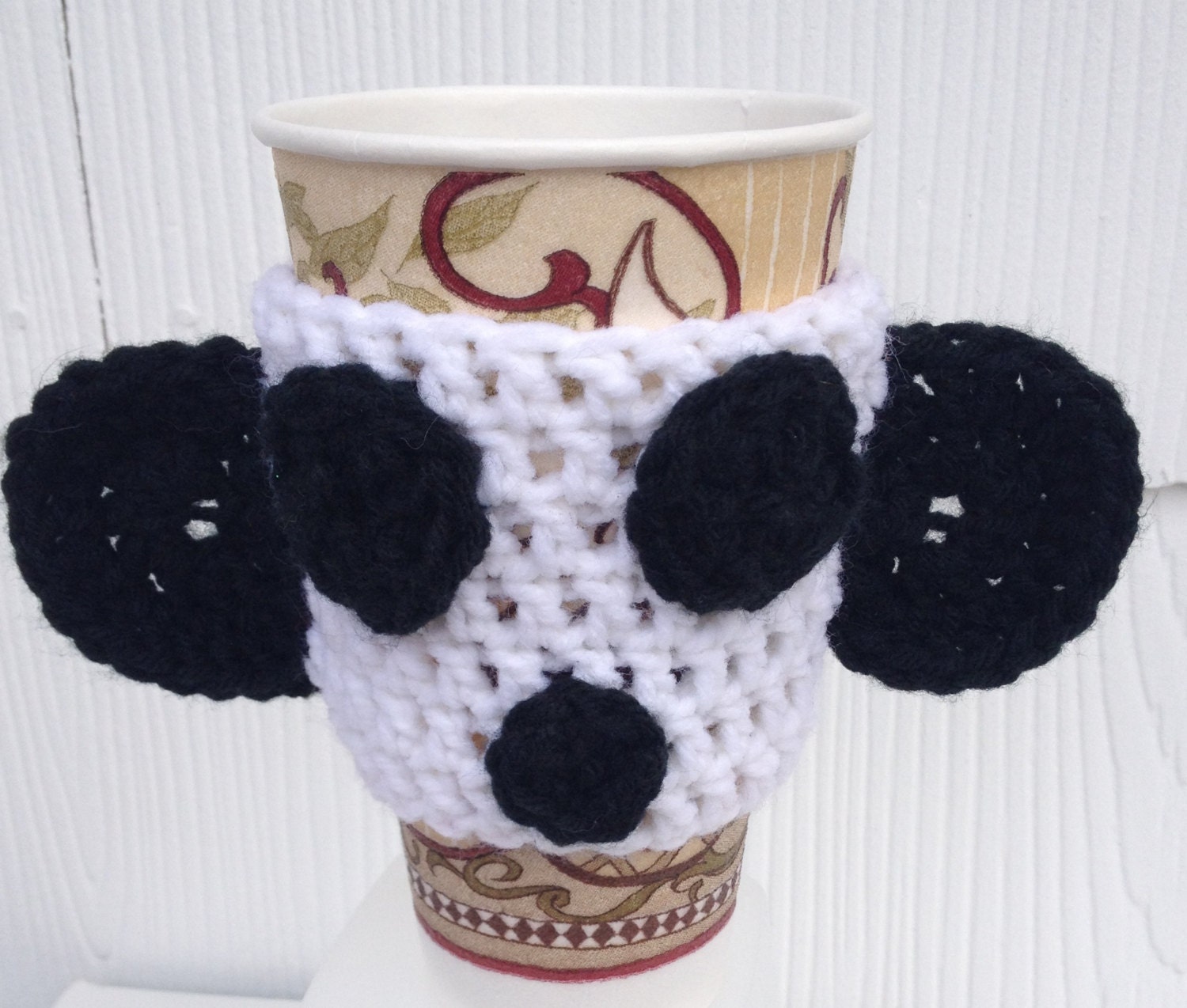 Summer Sale 20% off w/ code "Summer"  Panda Coffee Sleeve Pairs great w/ a Starbucks Giftcard.  Fits on your wrist for a punk rock wristband