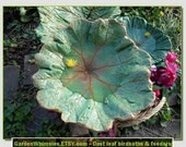 The fairy's umbrella becomes the birdies' bath - Indian Rhubarb leaf cast into a concrete leaf birdbath/feeder on a pole (Leaf 1475)