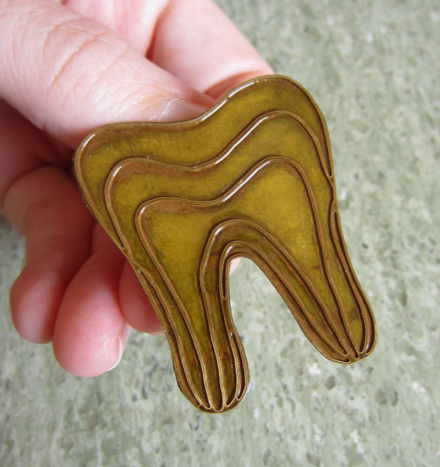 Brass Tooth Brooch