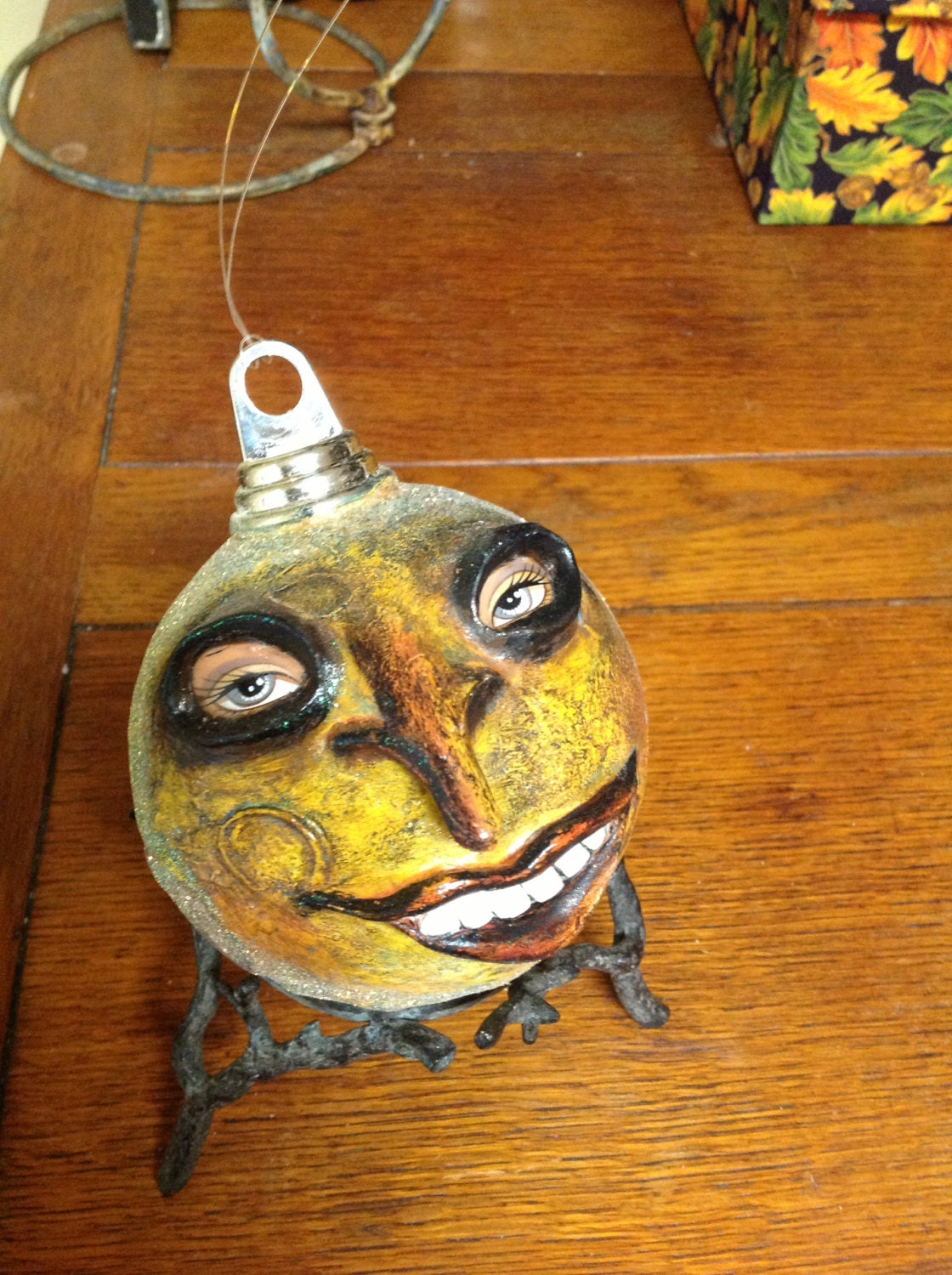 Spooky moon face ornament