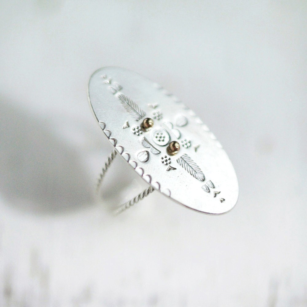 Oval Mystic Orient solid silver ring with a drop of gold