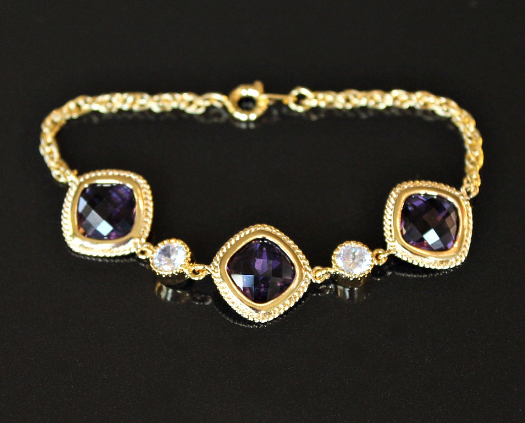 Faceted Amethyst Crystals and Cubic Zirconia Set in Gold on a Gold Link Bracelet