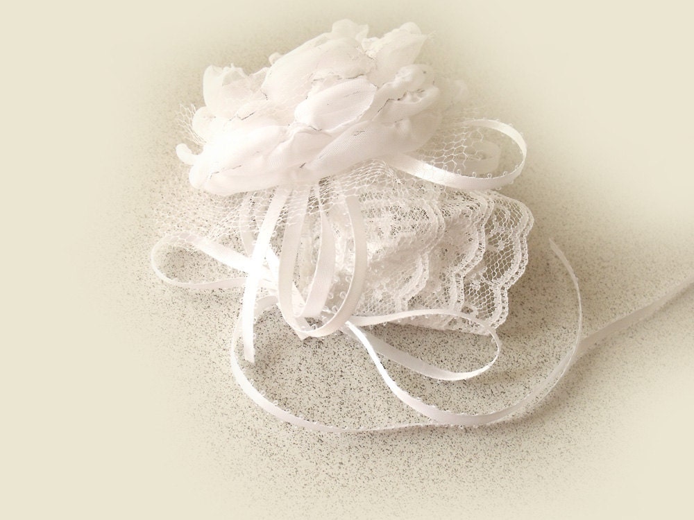 Wrist corsage for prom or wedding. White corsage cuff.