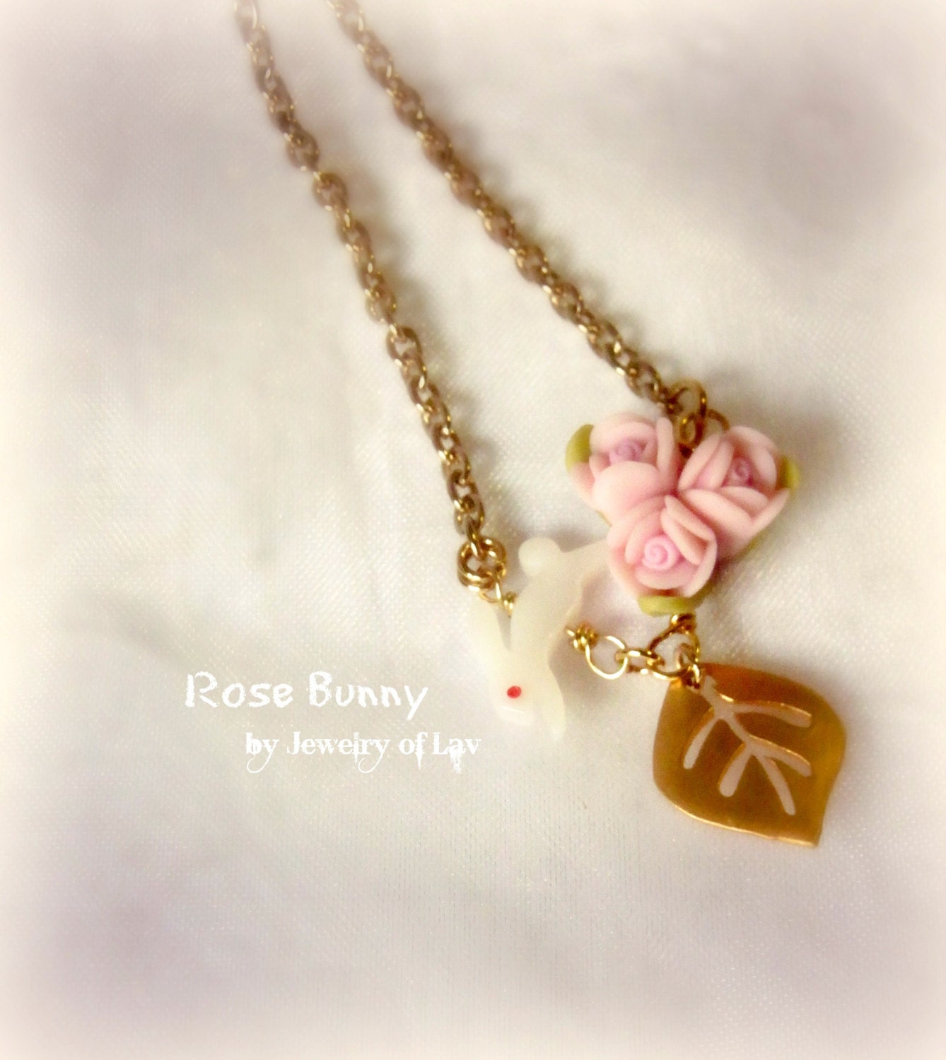 Rose Bunny necklace made of pink clay roses, shell rabbit, leaf charm, gold-plated chains etc.