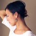 Elegant silver earrings with feather shapes soldered together to a hoop to make a modern piece of jewelry - "Peacock Hoop Earrings"