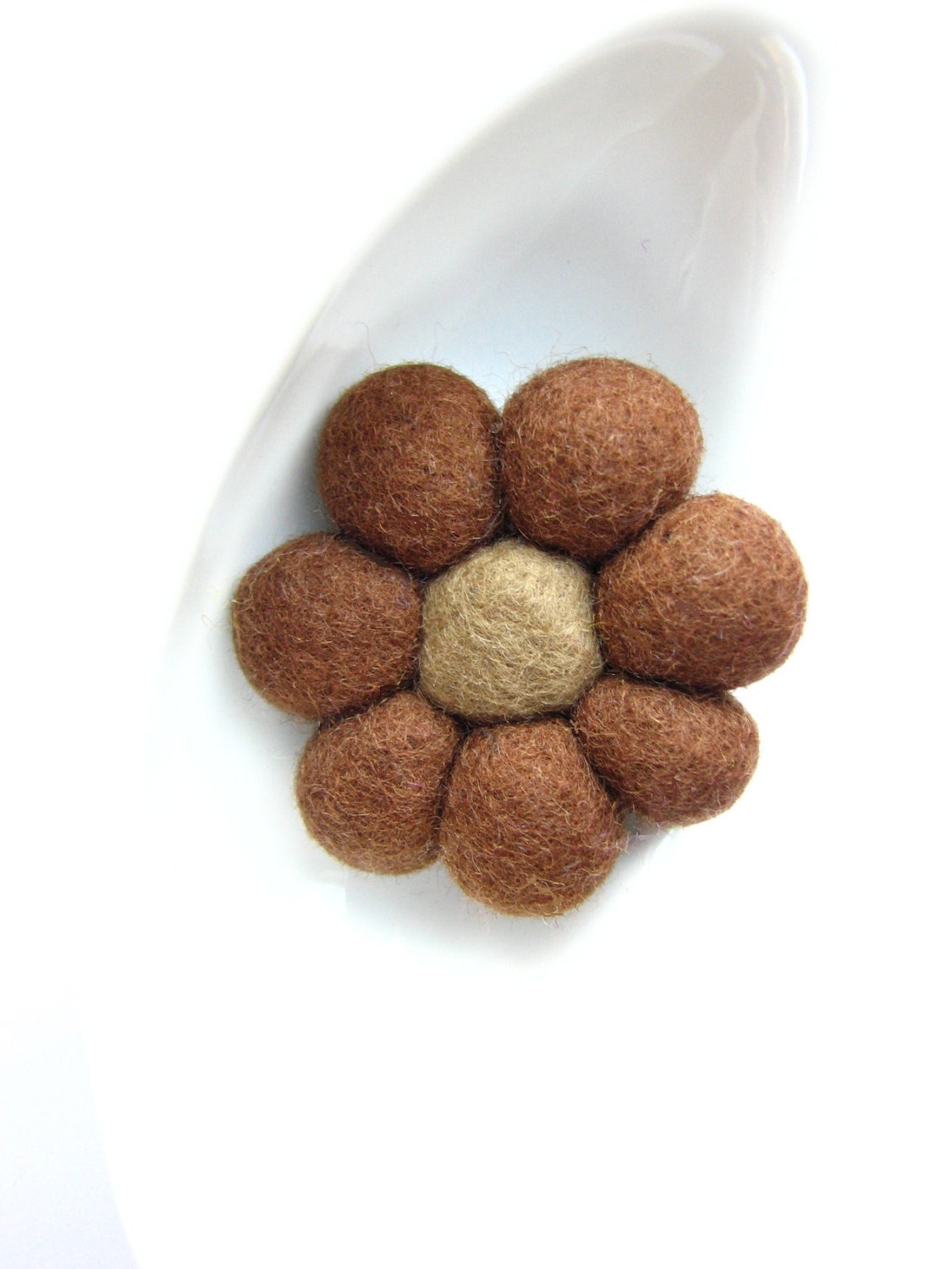 Brown felted wool flower