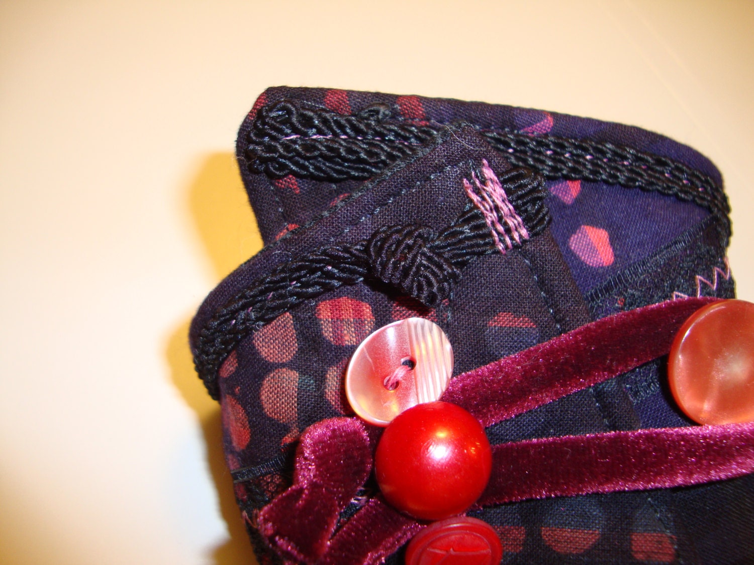 Buttoned Cotton Print Art Cuff in burgundy and black with red buttons