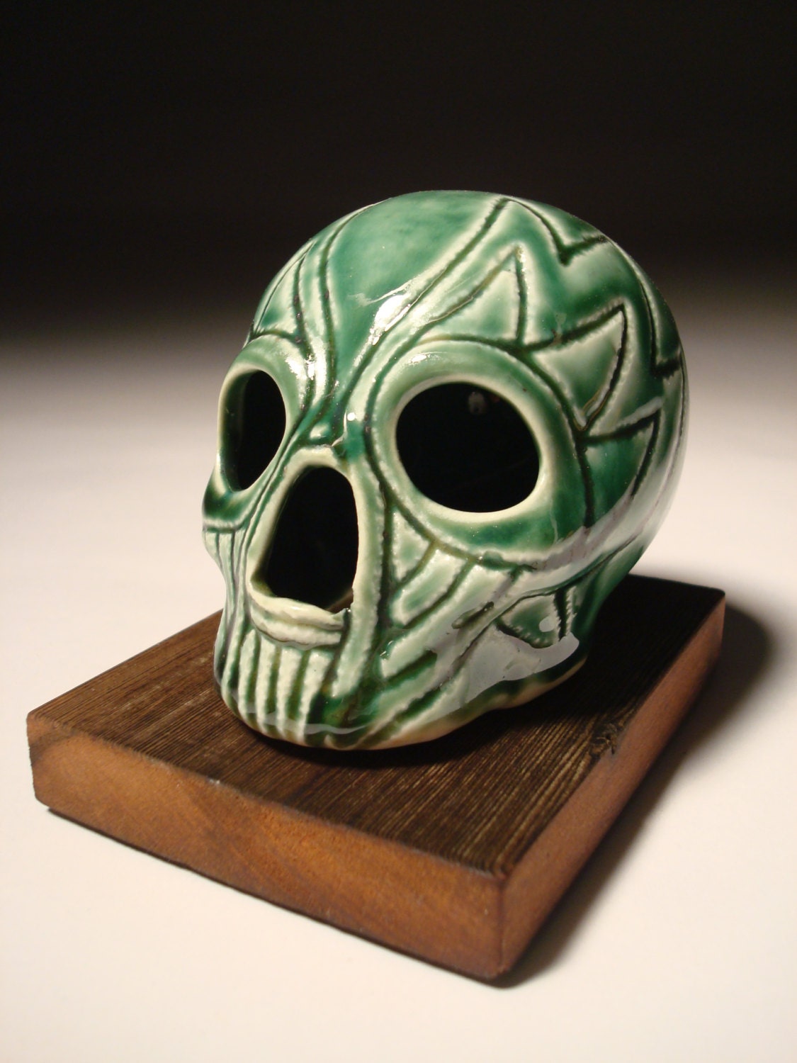 Green Head Two Wings Skull