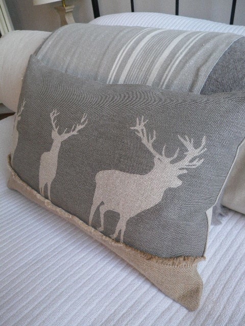 Hand printed muted grey triple stags cushion cover