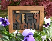Letterpress Framed Keep Right sign with left arrow