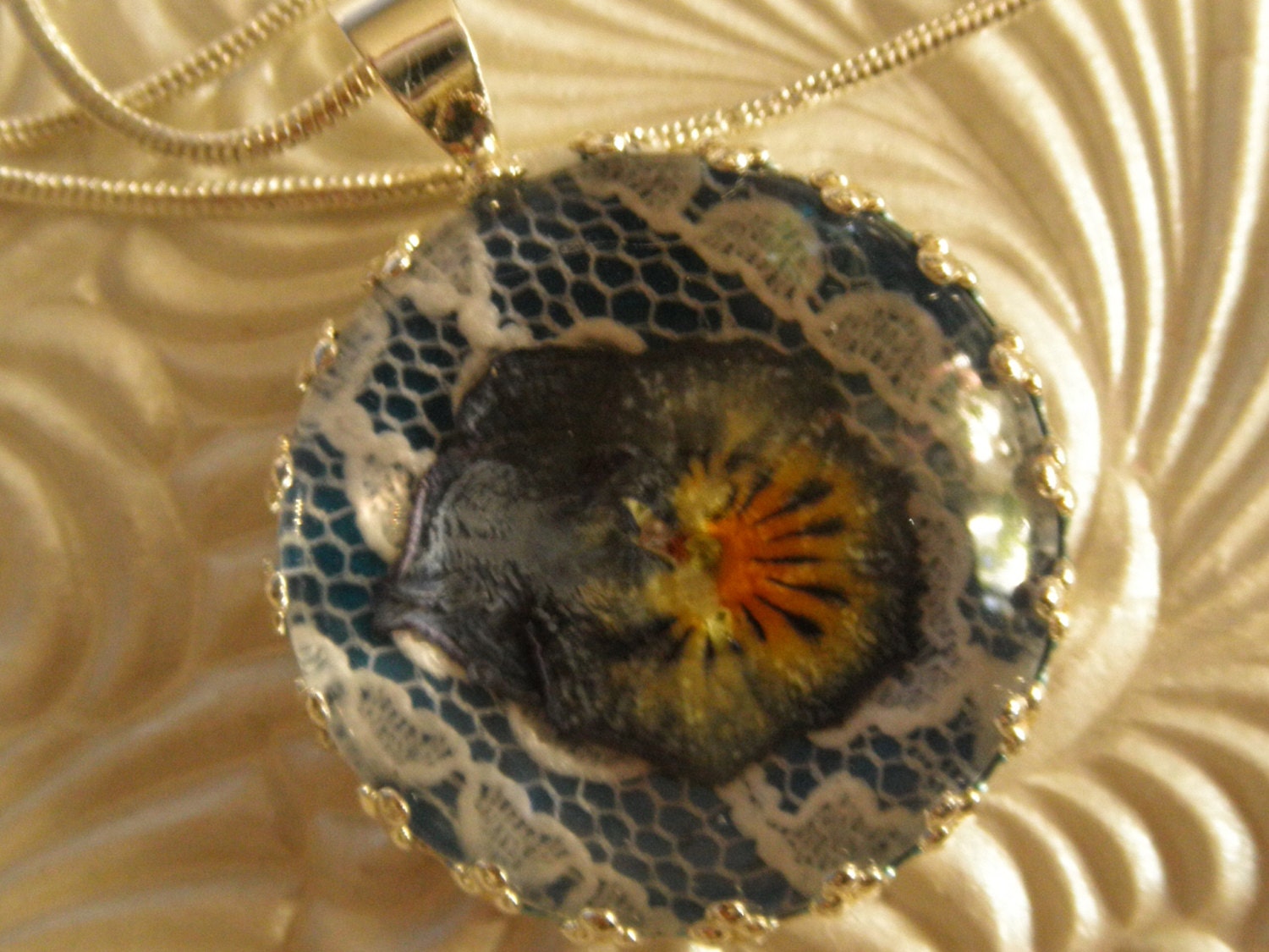 True Blue Romance-Ombre Purple and Yellow Pansy Atop Lace-Royal Blue Background Pressed Flower Crown Pendant