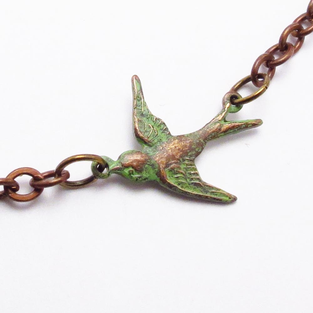 Tiny Bird Necklace Vintaj Brass Patina Flying Sparrow