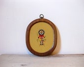 framed buffalo kachina needlepoint