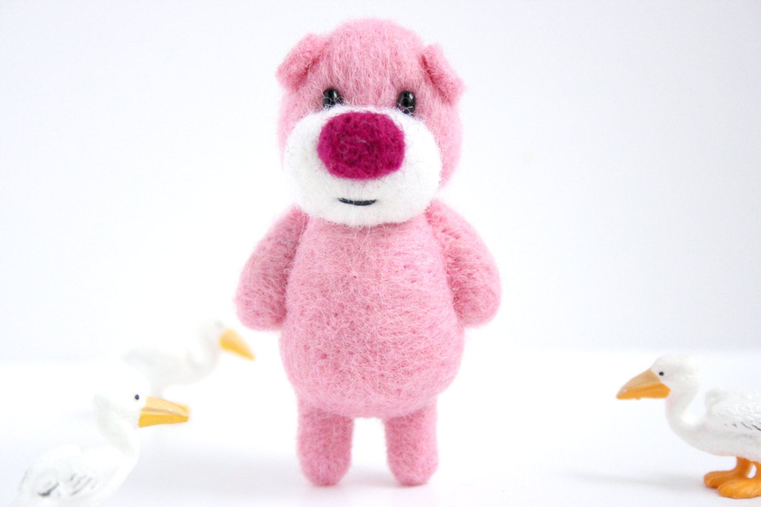 Light pink pocket miniature bear with a deep pink nose