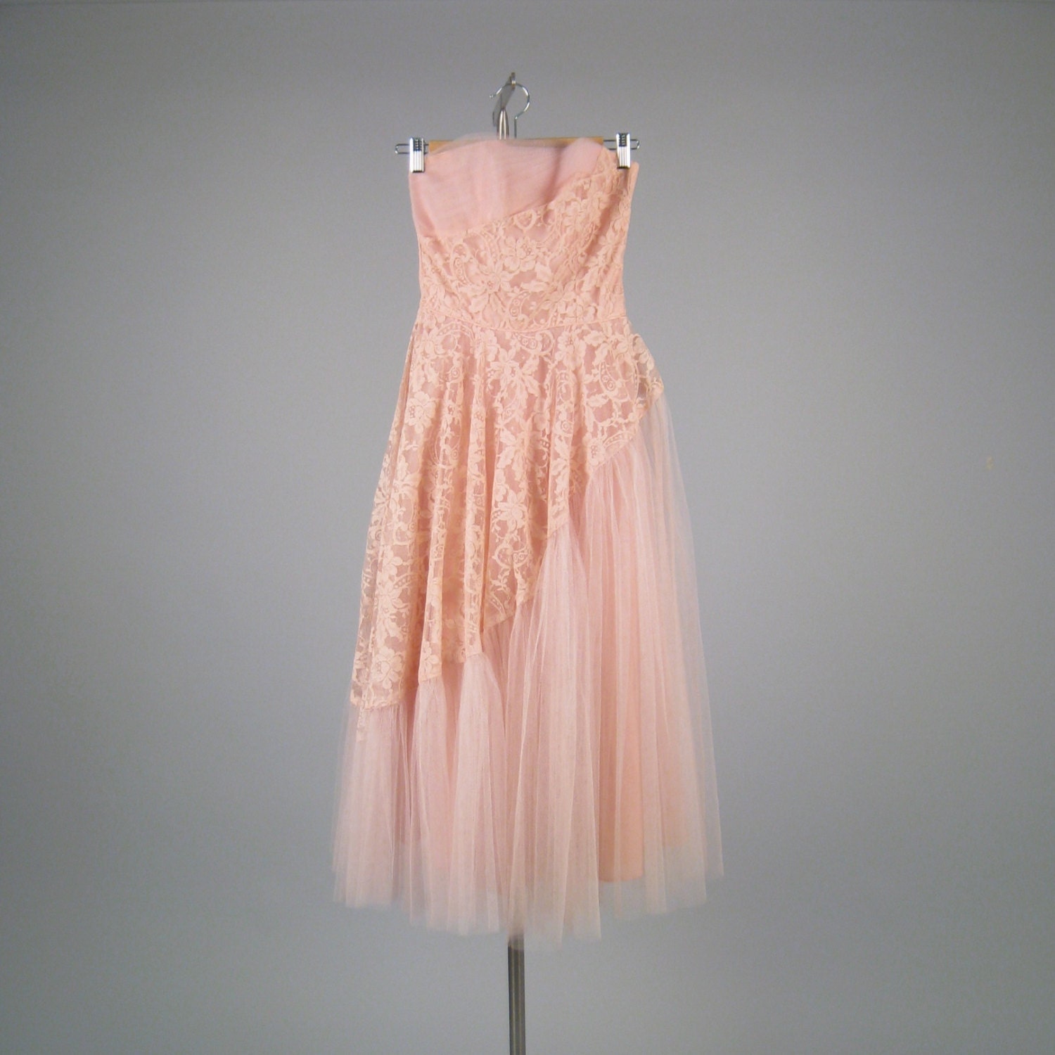 Vintage 1950s bubble gum pink strapless dress