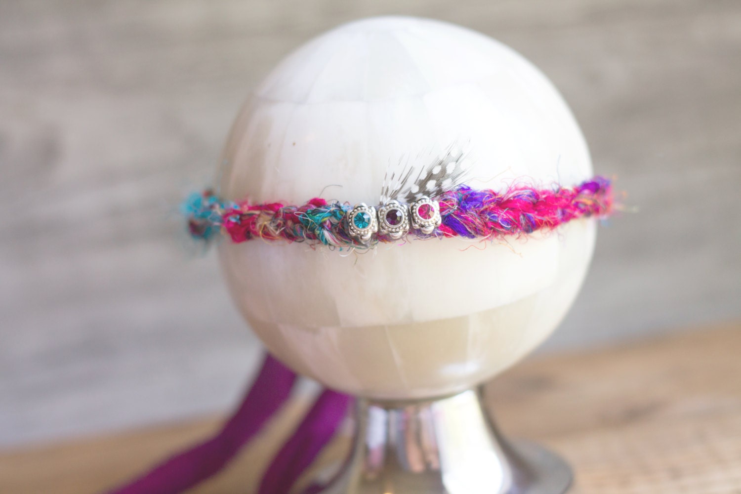 multicolor rhinestone and feather halo/tieback