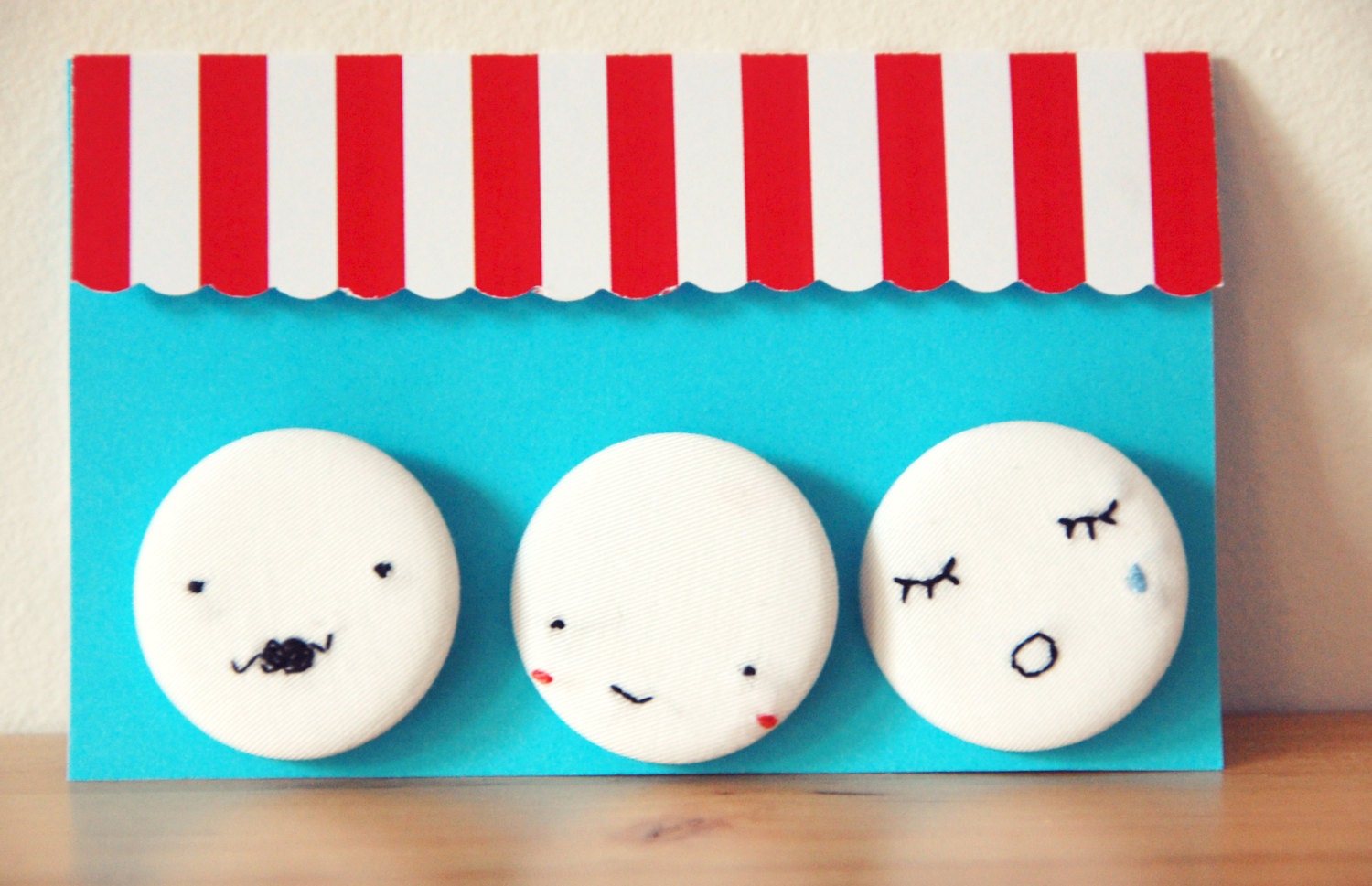 Hand embroidered little faces badges set