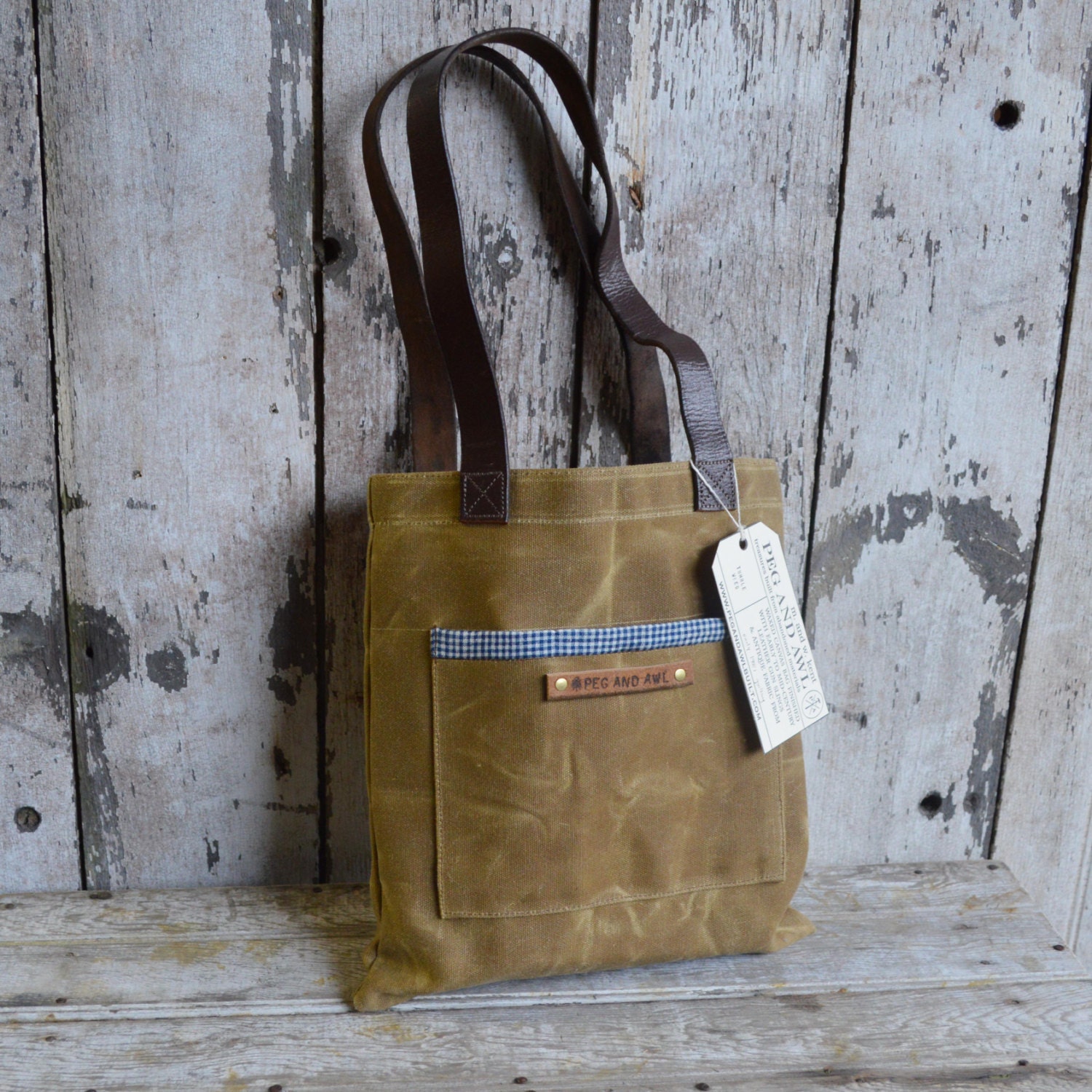 Waxed Canvas Reader: Tumbleweed, antique military leather, antique fabric.