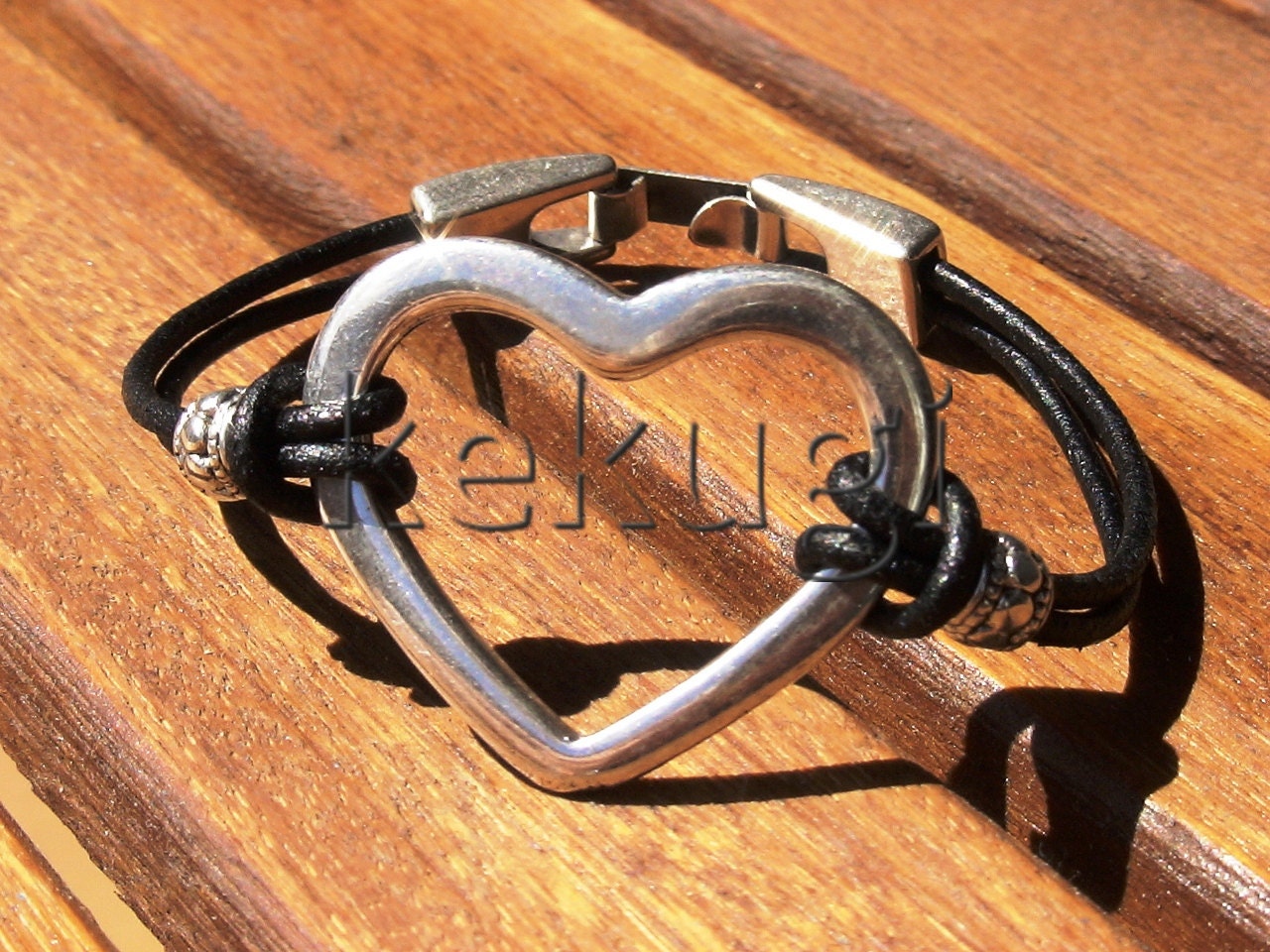 black women  leather bracelet with silver heart link and decorative beads