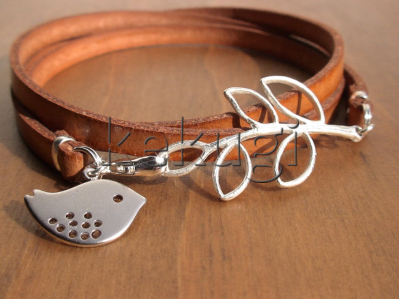 multi wrap camel flat leather bracelet with silver leaf connector and bird