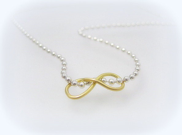 Infinity necklace in sterling silver and 18 karat gold