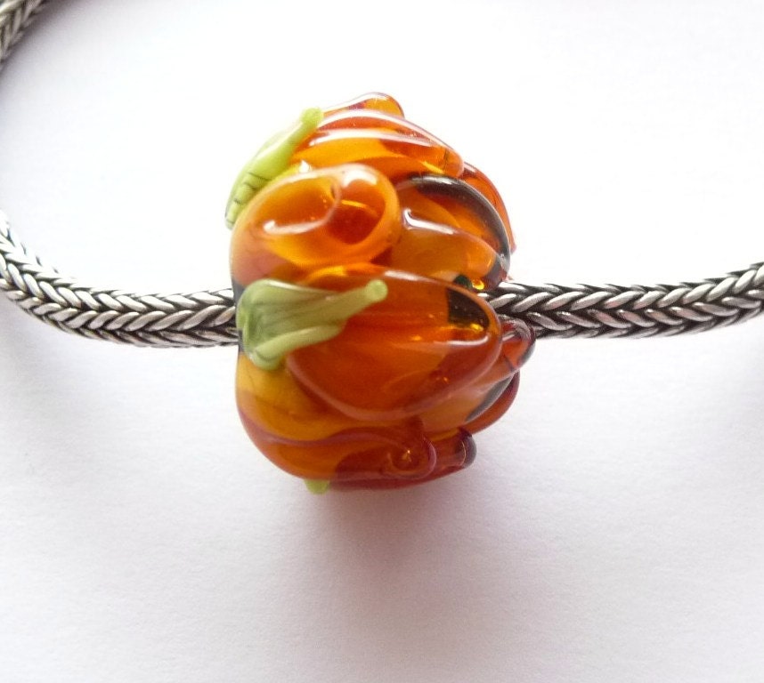 Orange flower in springtime / garden bead