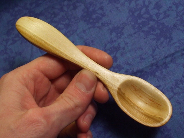 Small eating spoon hand carved from natural two toned wild cherry wood