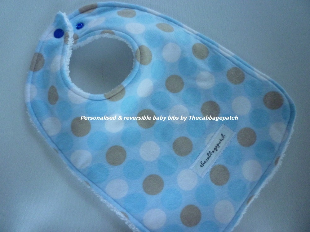Handmade personalised baby bib adjustable reversible Large dots on blue or pink