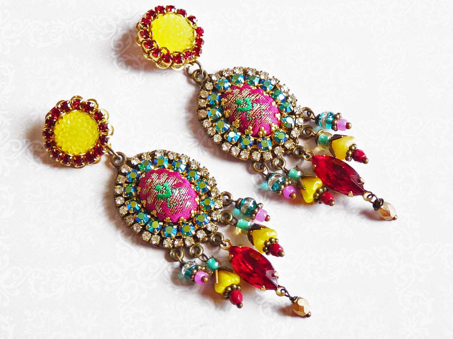 yellow sun chandeliers earrings bright colors with green and red