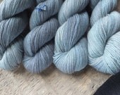 Soft Blue Fade -  Hand Dyed Mink Merino Silk Yarn - Knitty Reviewed