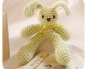small amigurumi bunny rabbit stuffed crochet plush animal in light green cotton yarn handmade