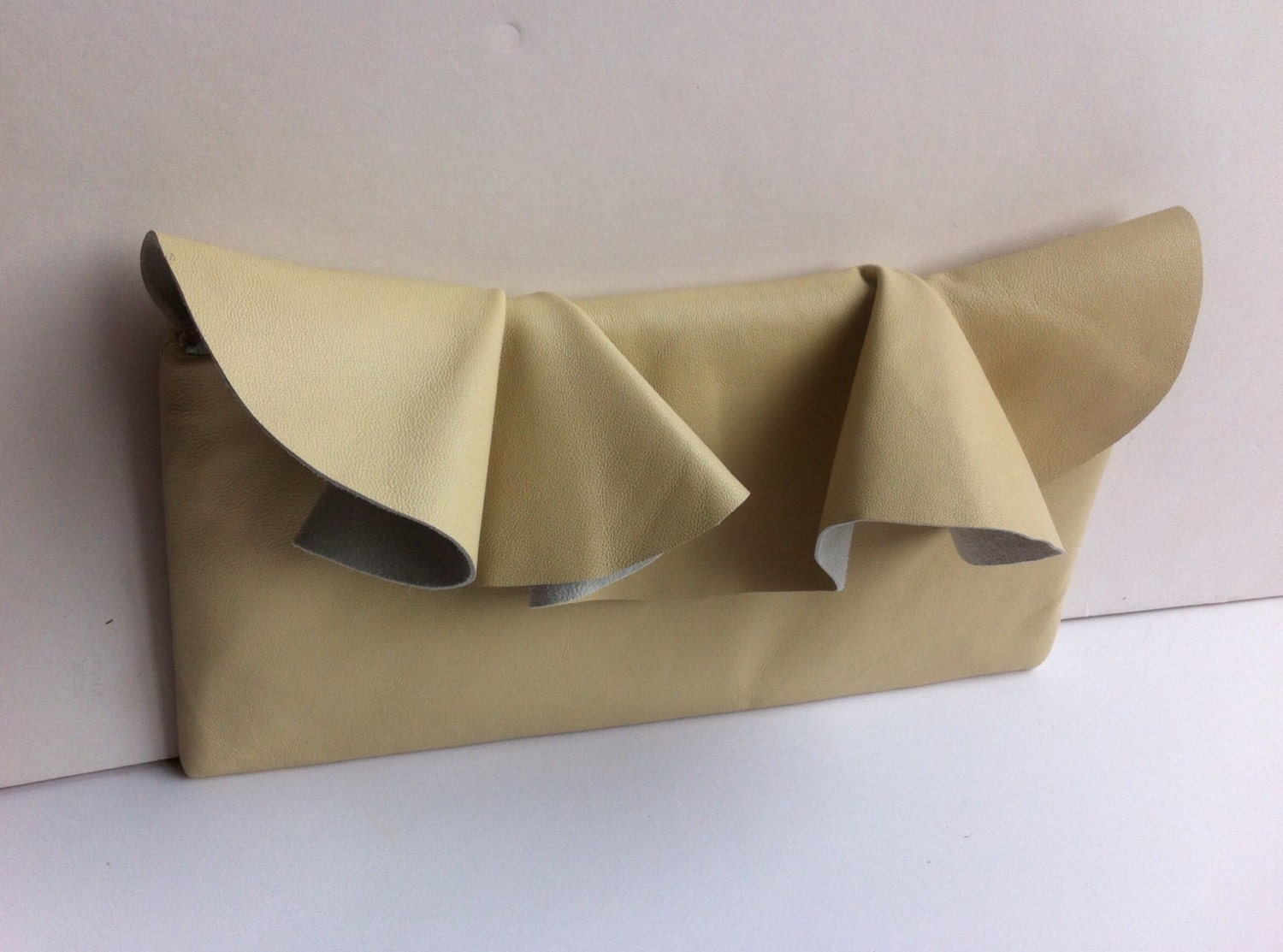 Pretty leather ruffle clutch in Ivory, perfect as a wedding accessory