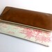 Limited edition clutch bag with vintage style print and tan leather, small
