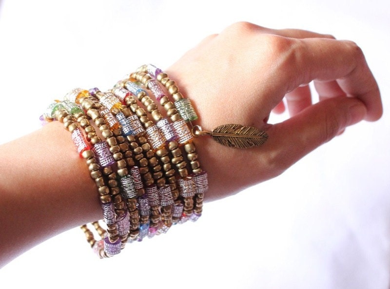 Saree (wire bracelet, gypsy inspired, feather charm, ethnic inspired)
