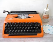 Vintage Brother 210 Portable Typewriter with Carry Case in Burnt Orange and Black