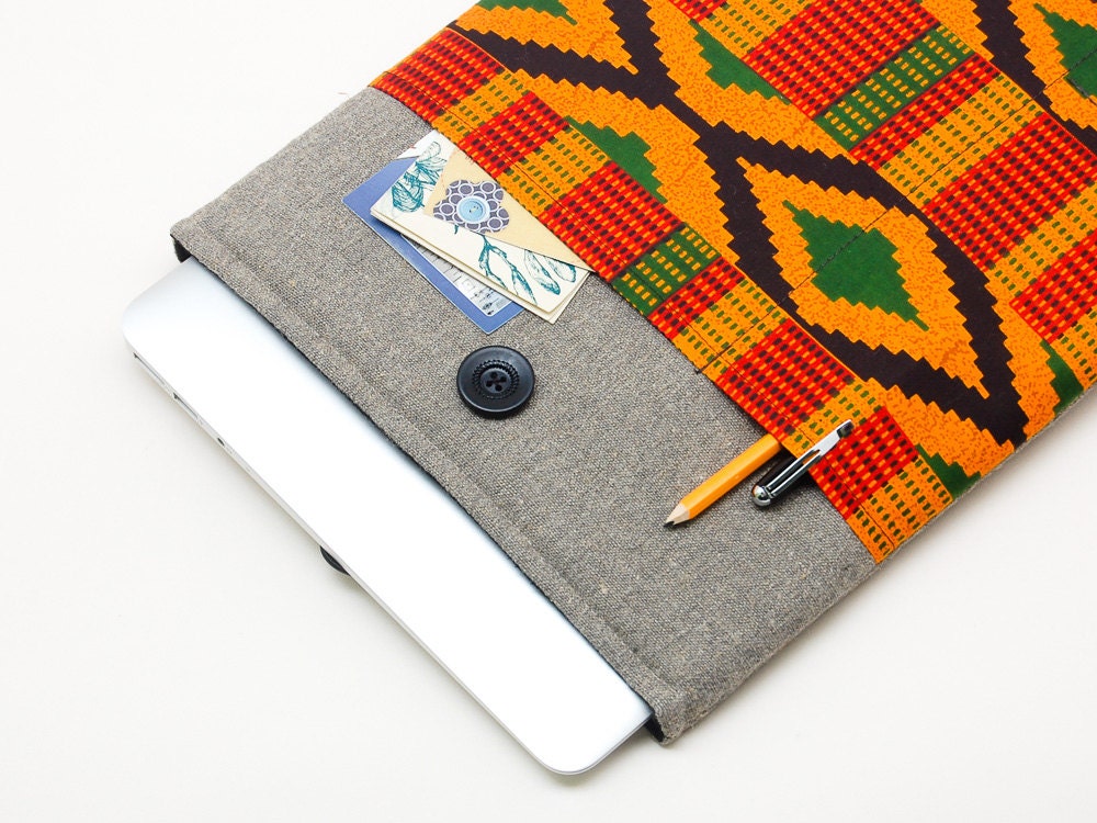 13 inch Macbook Pro case. Linen Macbook 13 sleeve with African print kente-style pocket. Custom bag, pouch and other cover orders available