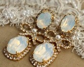 Chandelier Crystal pearls and bow's bridal jewelry - 14 k plated gold earrings real Swarovski opal and clear crystals .