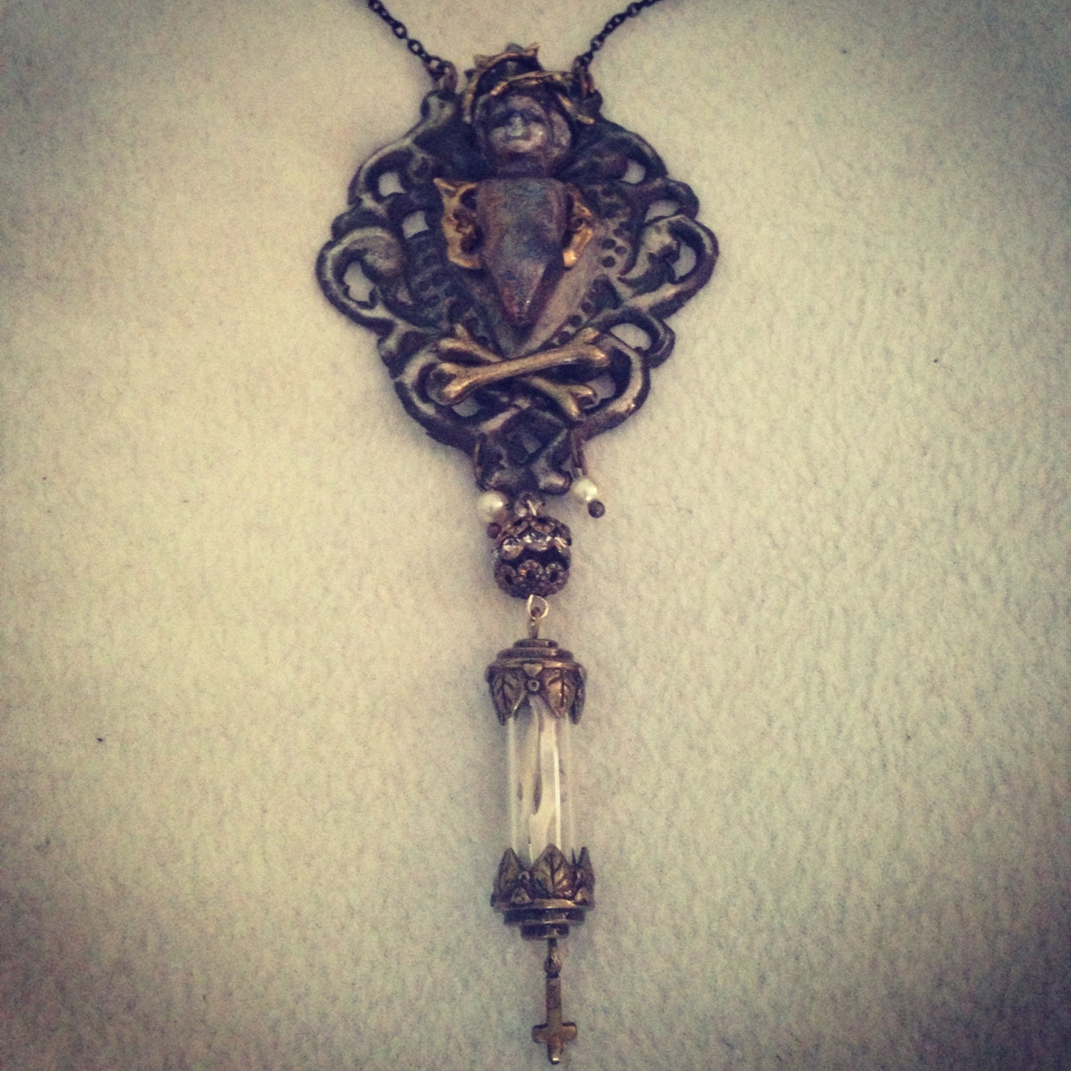 Ox Tin Ex Voto and Vintage Doll Necklace Blasphemy. Collection