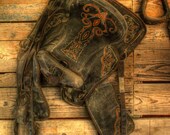 Antique Saddle hanging in the Stable