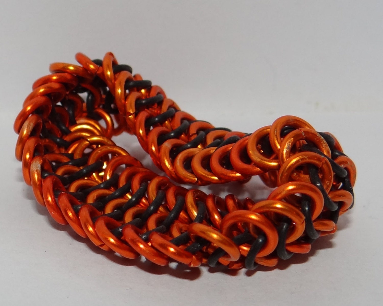 Orange and Black Punk stretch chain mail bracelet