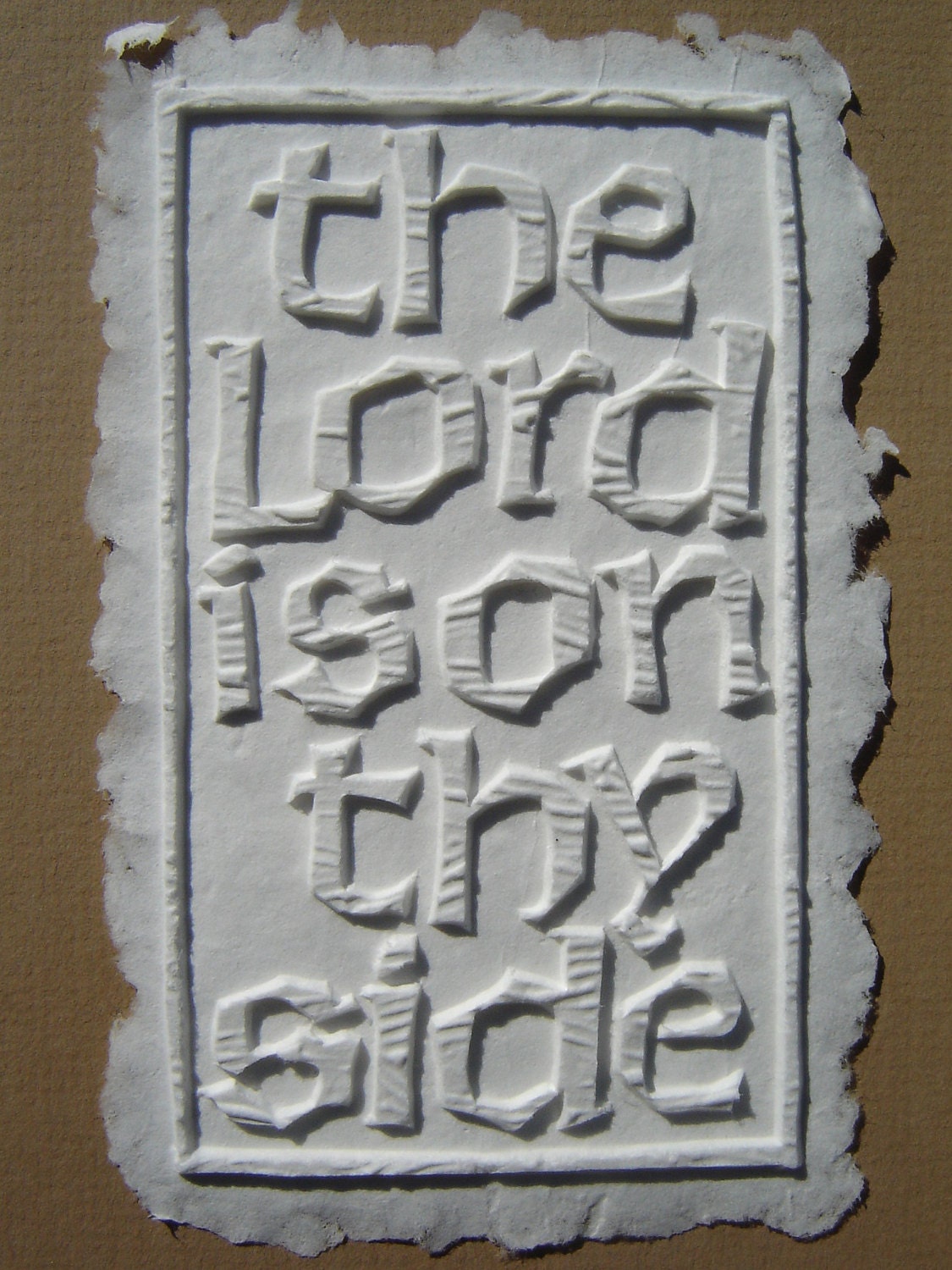 striking papercasting matted to 8x10 on tan backing