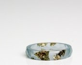 size 8.5 overcast blue thin multifaceted eco resin ring -  featuring gold leaf flakes